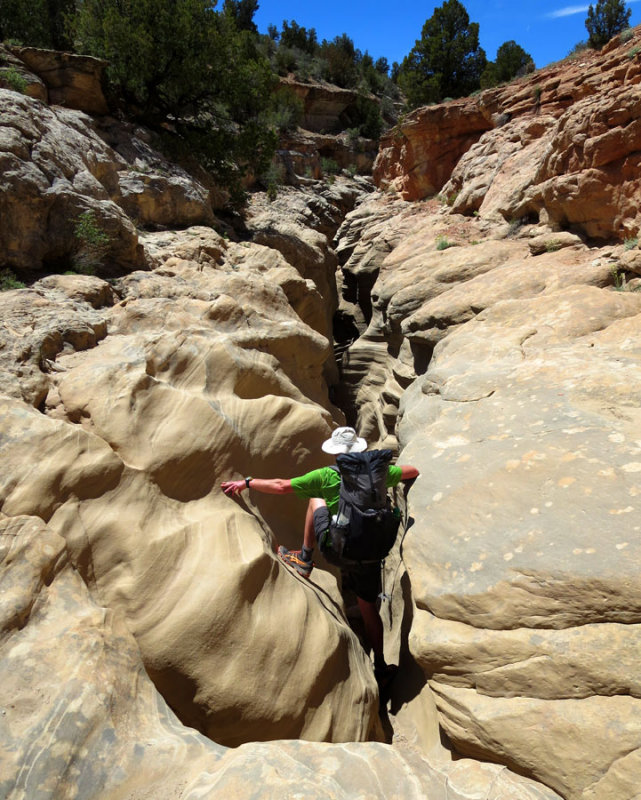 Down,down,down! Descending into Round Valley Draw slot canyon