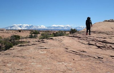 Slick rock walking looking to the La Sal mountains, Arches NP