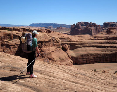 Martina looks out for our rocky descent scramble towards Courthouse Towers, Arches NP