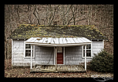 Two Windows and an Old Red Door