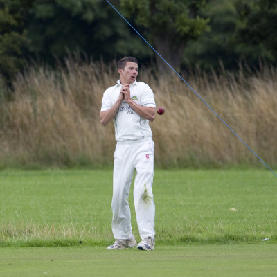 15. The fielder looks despairingly at the escaped ball