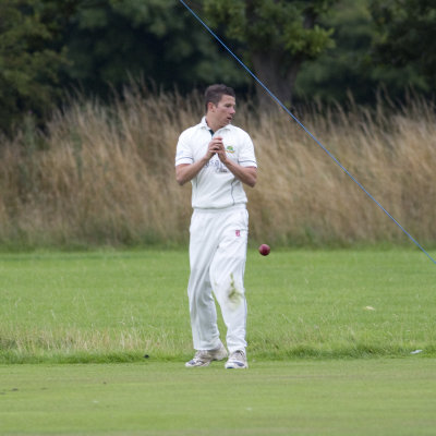 16. The beleaguered fielder is denied any mercy as the ball drops over the whitewash for a maximum.