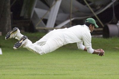 21. A stunning diving catch in front of the clubhouse by Scholes player Ranasinghe, to remove Richard Mollitt
