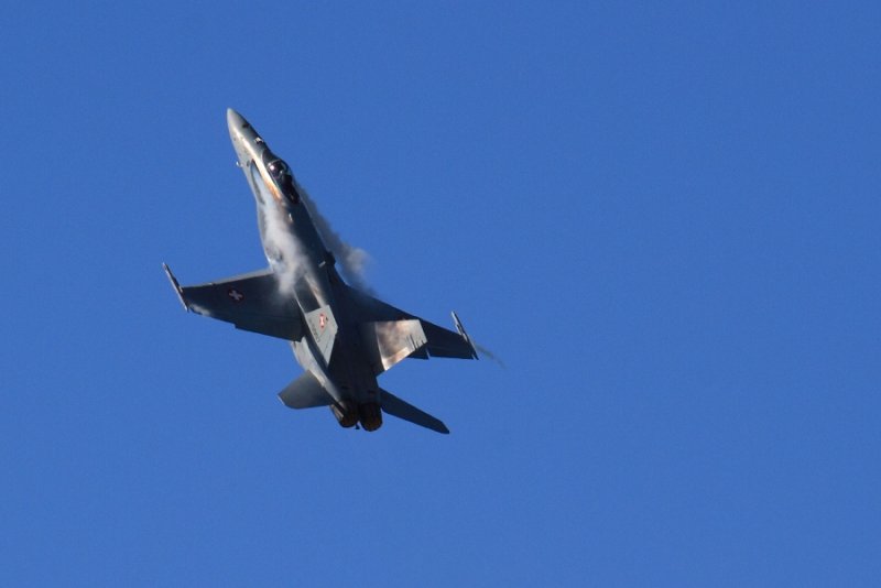 Swiss F-18 Hornet climbing away