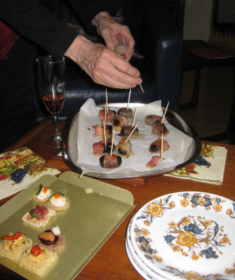 More hors d'oeuvres: bacon-wrapped prunes