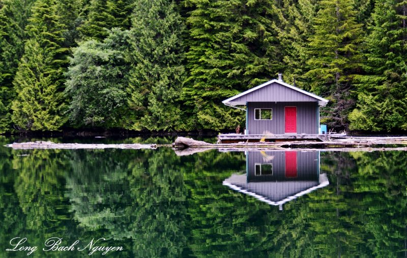 red door and blue,  floating cabin, Julia Passage, Vancouver Island, Canada