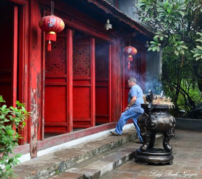 John enters Ngoc Son Temple Hanoi Vietnam   