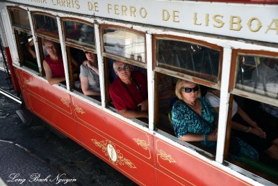 passengers on tram 7, Lisbon, Portugal  