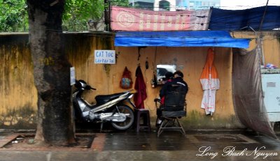 Outdoor haircut, Hanoi, Vietnam  