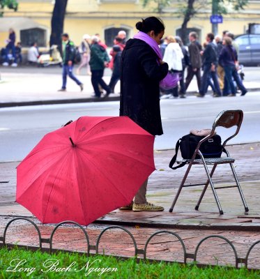 tourists photographer, Lake Guom, Hanoi, Vietnam  