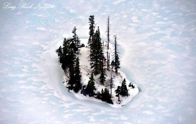 Island in Frozen Thomson Lake, Cascade Mountains, Washington  