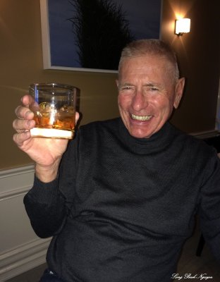 David toasting to Charlie Hogan for cocktail hours