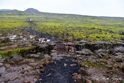 Crossing the fault line, Thirhnukagigur Volcano, Iceland  