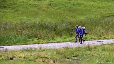 Hikers on trail Scottish Highland UK  