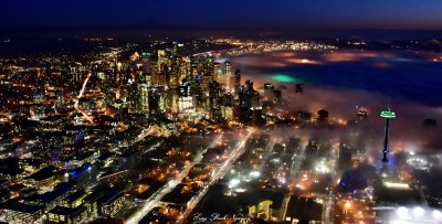 Seattle shows Seattle Seahawks Blue and Green Colors, Space Needle, 12th Fan, Shroud in Fog  