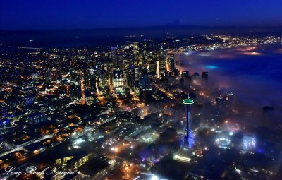 Seattle shows Seattle Seahawks Blue and Green Colors, Space Needle, 12th Fan, Shroud in Fog, Mt Rainier