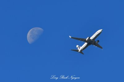 Alaska Airlines B-737 with Moon