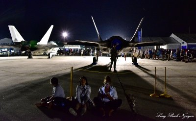 Resting behind F-35 and F22    