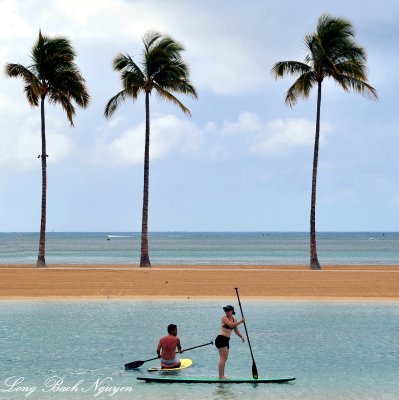 Paddle boarders at Duke Kahanamoku Lagoon Waikiki Beach Oahu Hawaii 060  