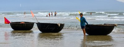 Fisherman and Swimmers on beach Da Nang 237