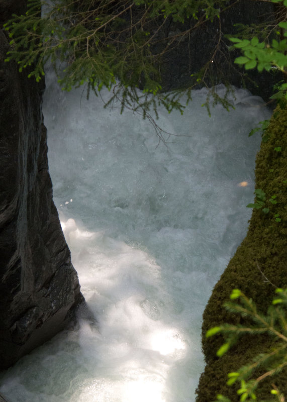 Underneath, a fast-flowing glacial stream