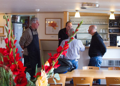 Aboard the Fleur, Kees and Gijs confer with Alan and Ron