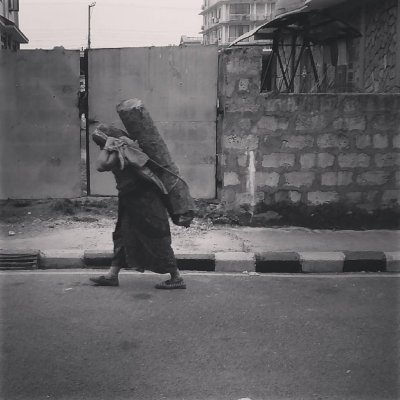 Full photo - Nepal woman carrying wood during fuel blockade