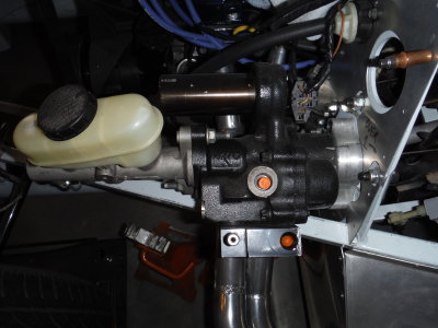 Power brake booster has three connections, two high pressure, one low pressure return
