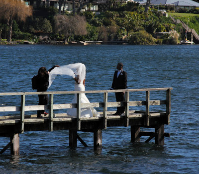 Having fun - taking photos of this windy wedding