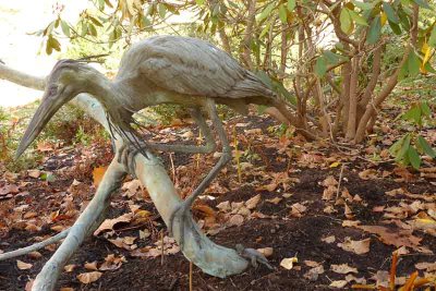 A bird sculpture in one of the many garden areas