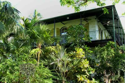 The secluded property is typical of The Keys with plants and trees to block the sun and provide shade and natural cooling.