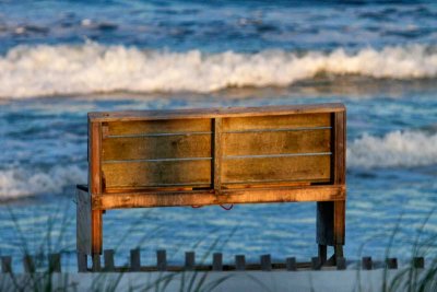 A lifeguard stand near sunset.