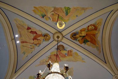 The imposing figures of the four evangelists with their symbols adorn the ceiling nearest the sanctuary. 