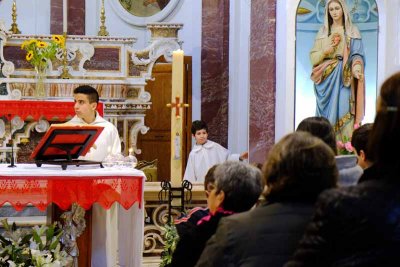 An altar boy - my father was an altar boy in this church