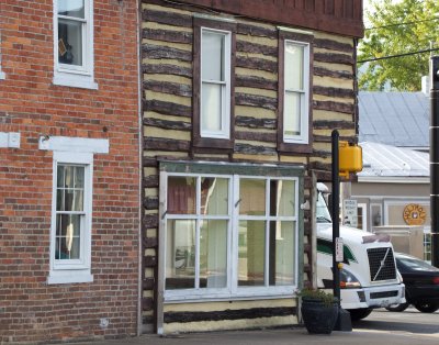 Incongruous log building downtown