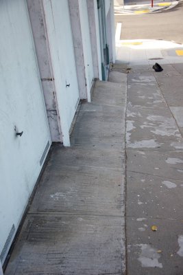 sidewalk modified with steps for garage exits