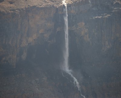 Glacier-fed waterfall across the valley