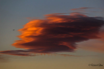 Lenticular Fire and passing Plane