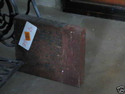 Massive Rectangular Iron Weight (behind wooden panel)