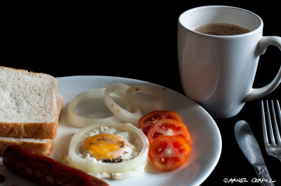 simple breakfast egg in onions + bread + hotdog + coffee