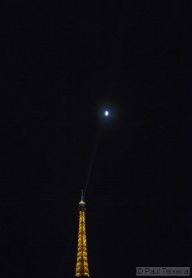 The illuminated Eiffeltower in the city of Paris, France on the 11th of May 2011