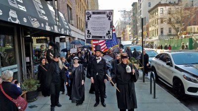 Abe, Liberty and Justice politely wait for traffic to clear