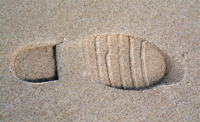 Foot prints in the sand.