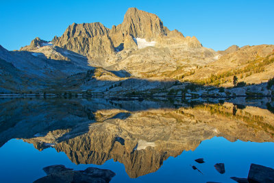 Early morning reflection of Banner and Ritter Peaks on Garnet Lake.