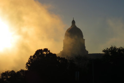 Sun shining through fog lifting off Missouri River at 8 a.m. on Sunday, 10/27/2013 by Missouri Capitol Bldg in Jefferson City