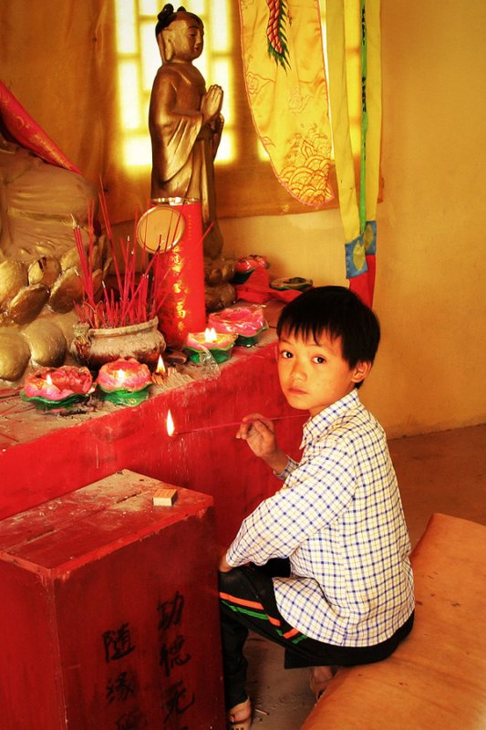 Praying boySecure, Anhui Province, China, 2006