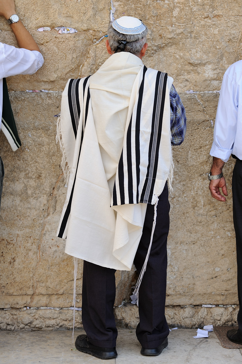 Jewish religious man praying at Western Wall