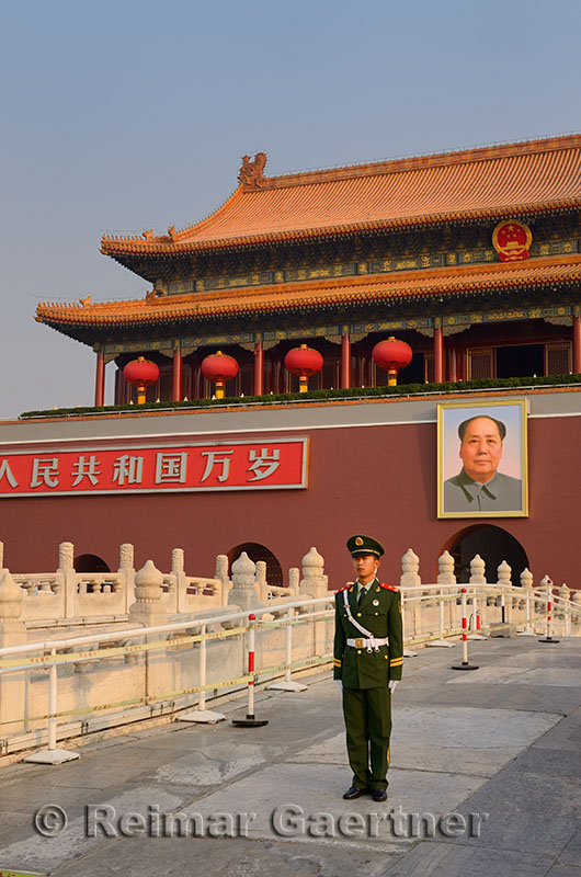 Peoples Armed Police guard with portrait of Mao Zedong at Tiananmen Gate of Heavenly Peace Beijing
