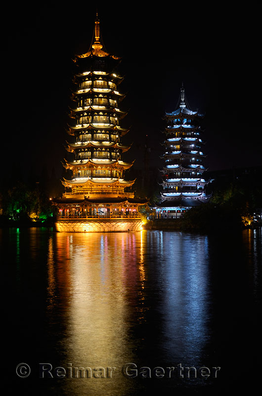 Sun and Moon Pagodas on Shanhu or Fir Lake in Riyue Shuangta Culture Park of Guilin China