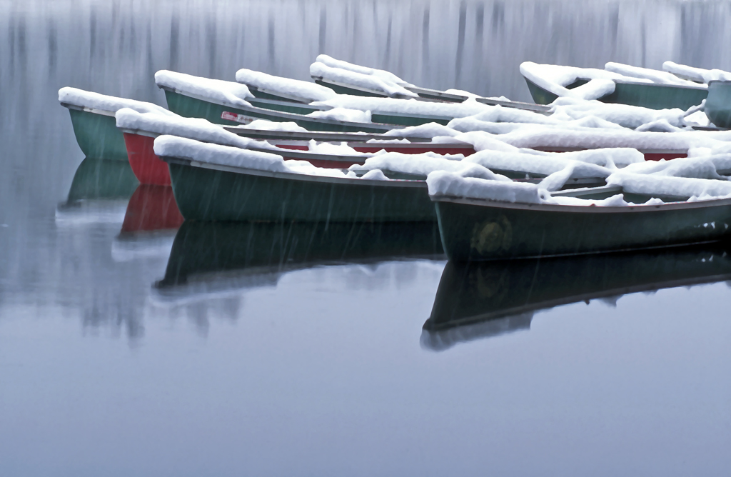 Canoes, snowfall